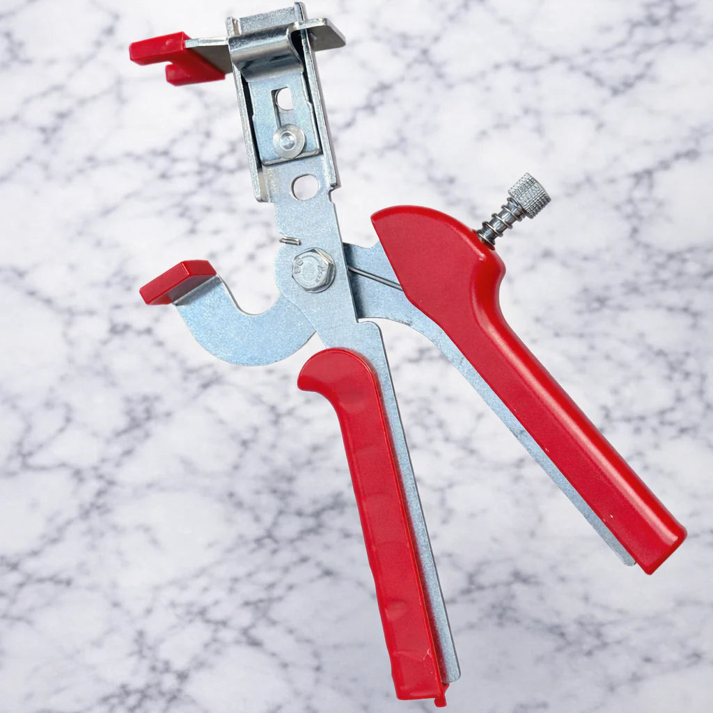 Oskita tile leveling pliers on marble background