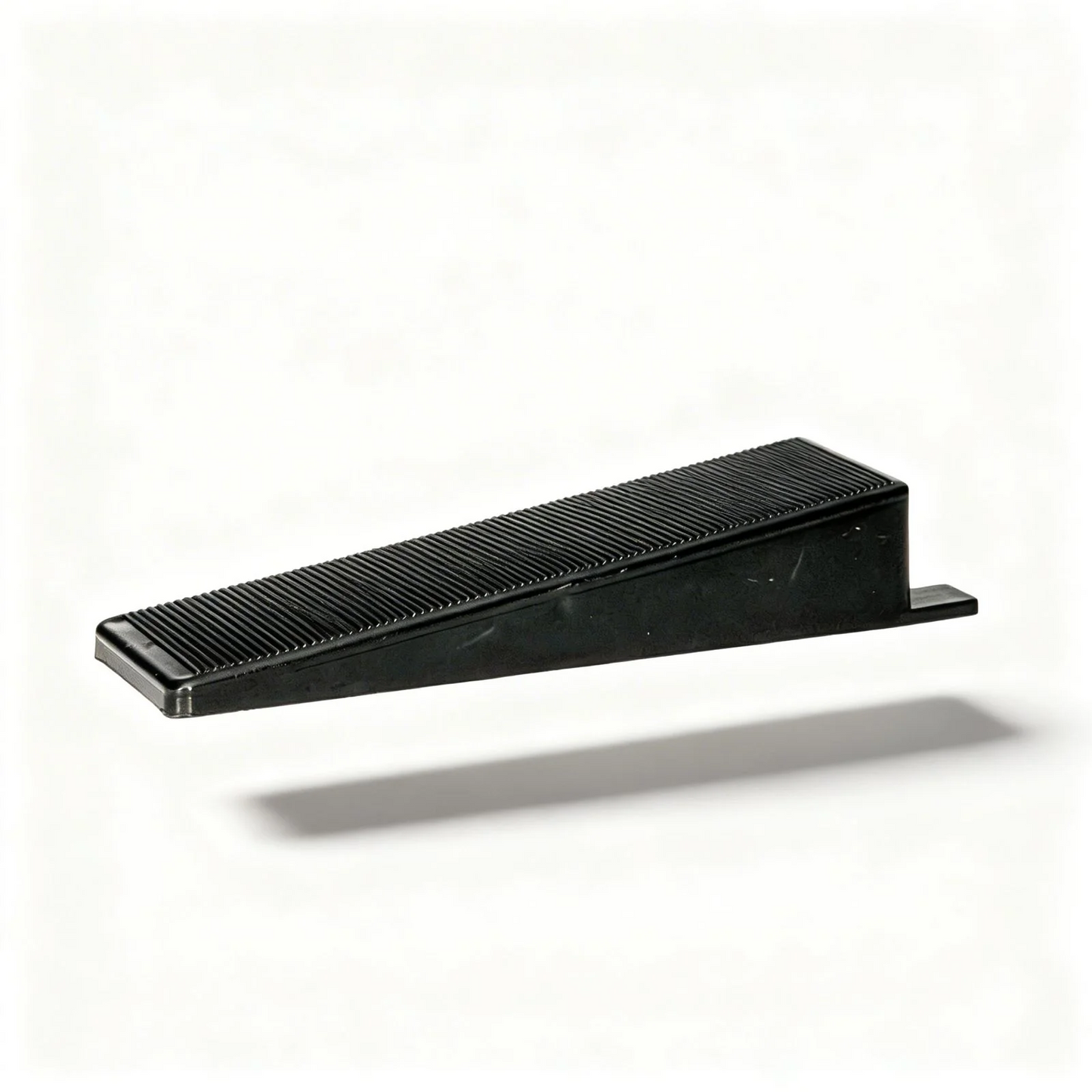 Oskita Civiplas tile leveling wedge on white background